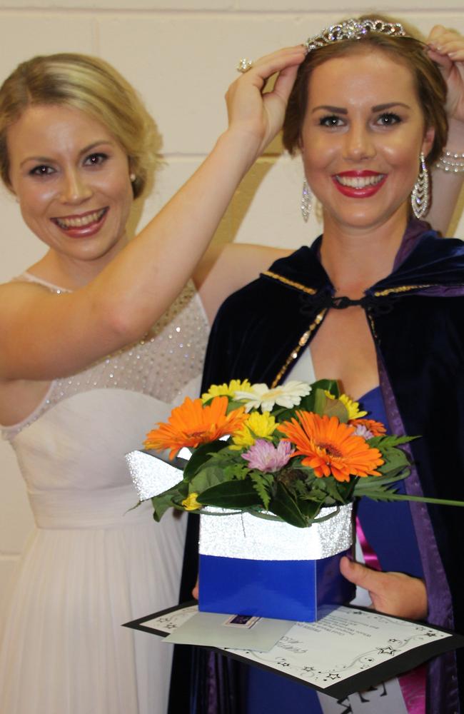 2015 Gympie Showgirl Ellen Wheeler gives 2016 Gympie Showgirl Stephanie Perrett a crown. Photo: David Crossley / Gympie Times