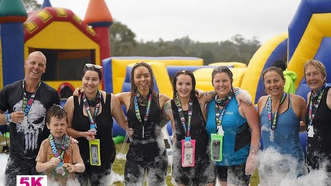 Celebrating with the team after the Foam Fest fun run in late November. Picture: supplied.