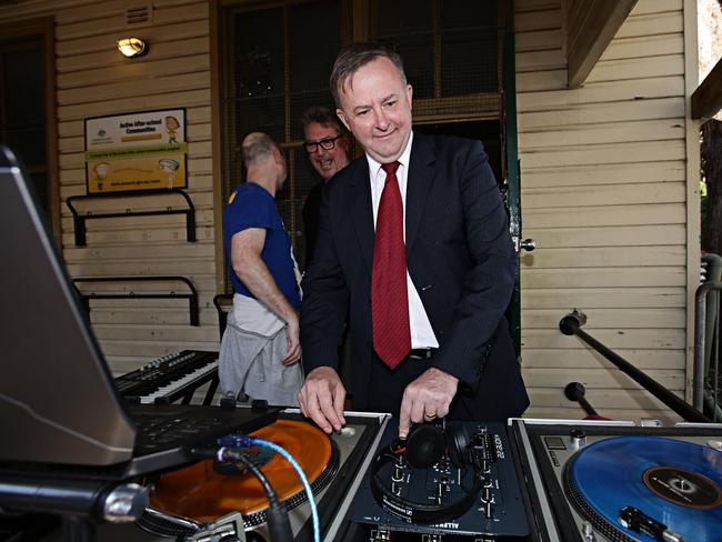 Anthony Albanese DJing to Shake it off by Taylor Swift at Annandale Public School after he cast his vote for the federal election. Picture: Adam Yip