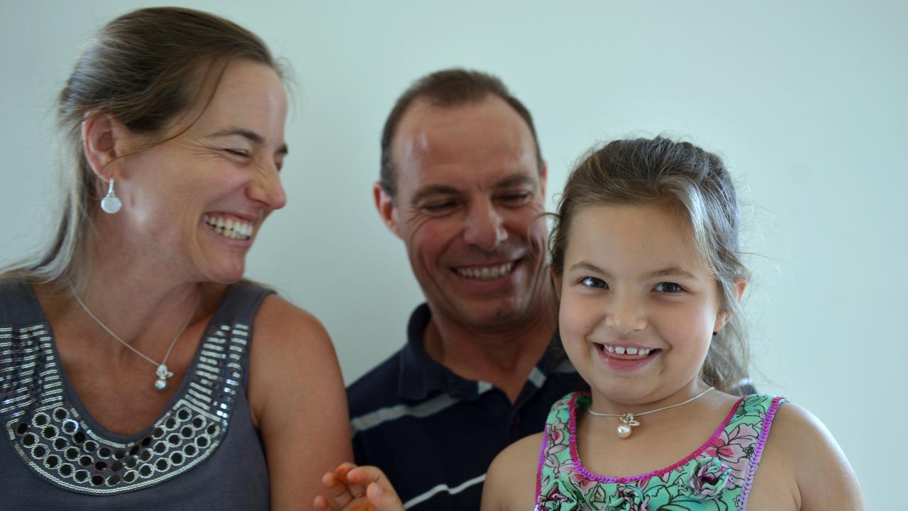 Zuri Bell, 5, with her parents Maria and Glen Bell at Hear and Say in Nambour. Photo: John McCutcheon / Sunshine Coast Daily