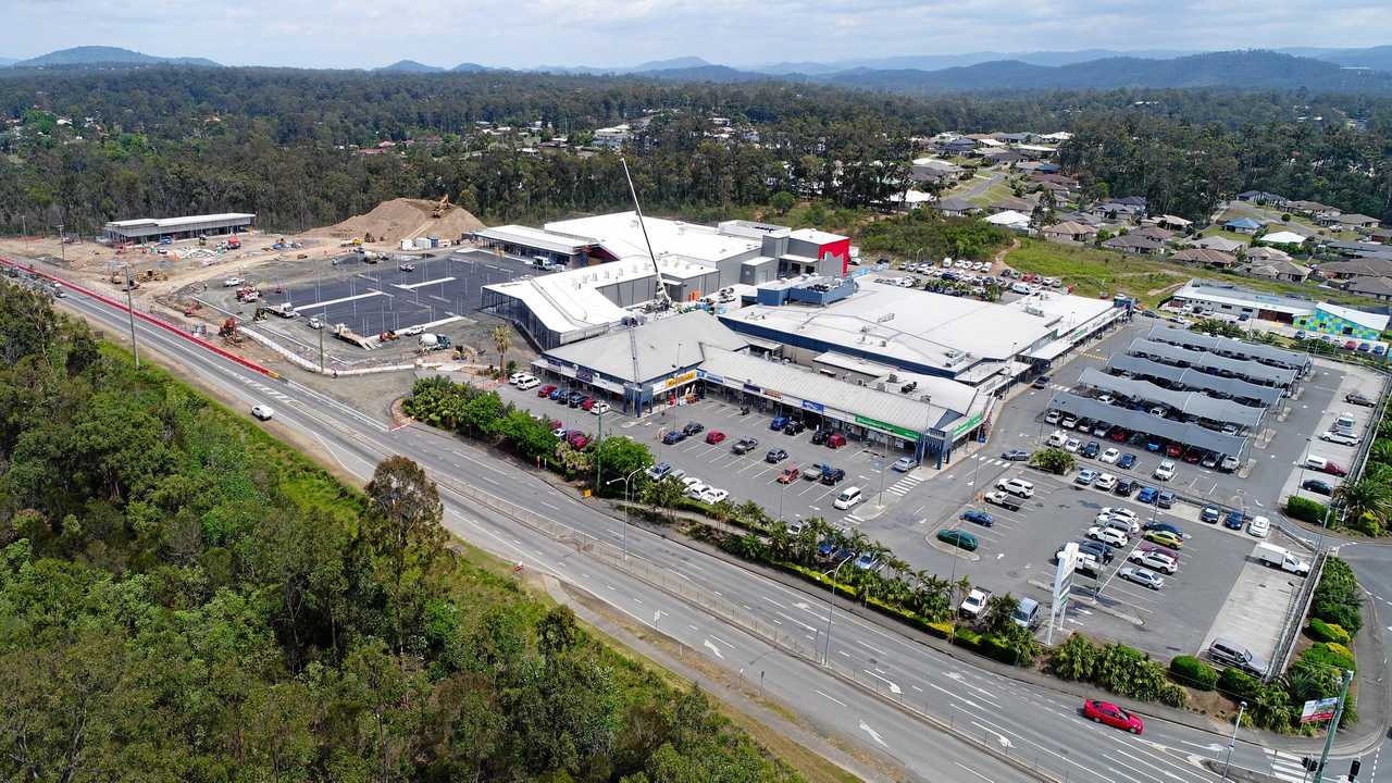 PETITION: Thousands of people have backed a grandmother's effort to fix the Warrego Highway and Mount Crosby Rd intersection. New homes coupled with the growing Karalee Shopping Centre (pictured) is putting pressure on the intersection. Picture: Rob Williams