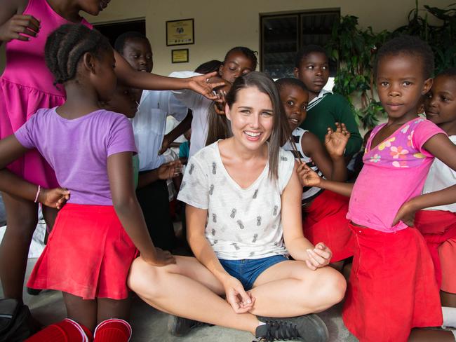 Heather Maltman has filled the void while in the jungle without her man by visiting the local orphanage. Picture: Benjamin Stavert