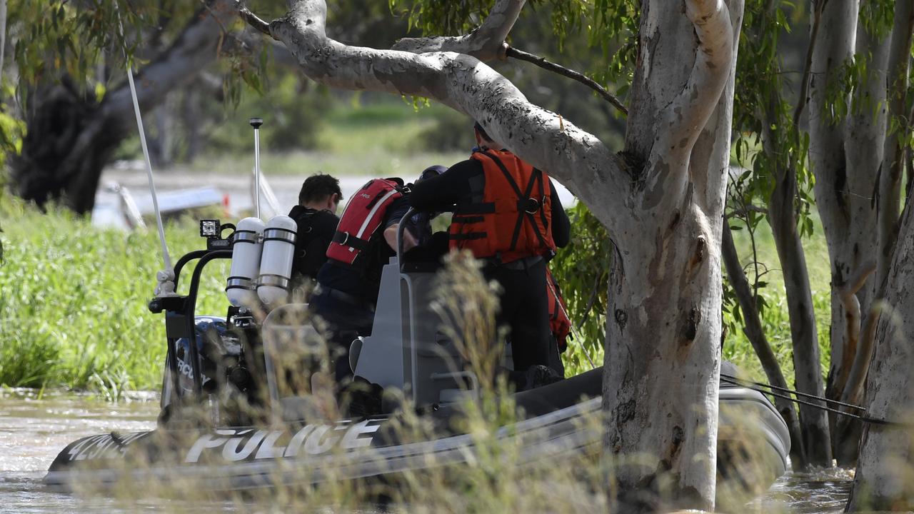 Police search for car missing in floodwater outside Toowoomba.