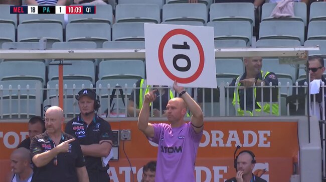 Port Adelaide runner Chad Cornes holds up a speed sign at the MCG.