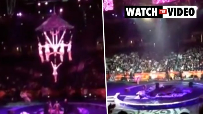 Horror moment eight acrobats suspended by their hair plunge to the floor