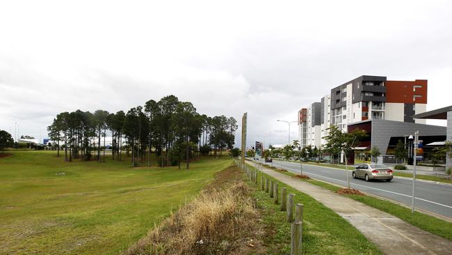 The site of where the former Gold Coast City Council planned its “Taj Mahal” administration building in Robina — looking down Laver Dr with the council site on the left.