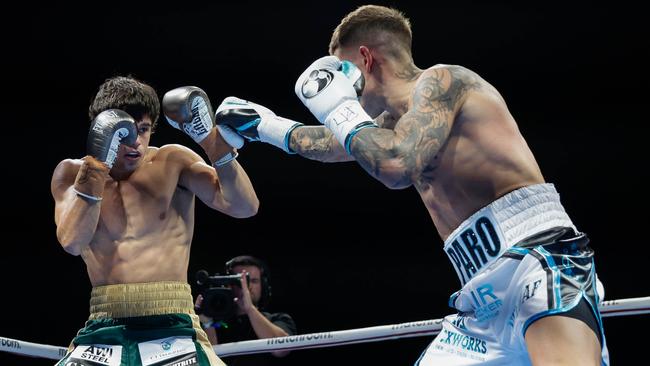 Liam Paro and Brock Jarvis trade punches during their super lightweight title bout, which didn’t make it to the first round bell. Picture: Russell Freeman/Getty Images