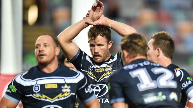 Horror start ... Cowboys’ Origin stars Matt Scott, Gavin Cooper, Coen Hess and Michael Morgan having a bad night out against the Sharks. Picture: Zak Simmonds