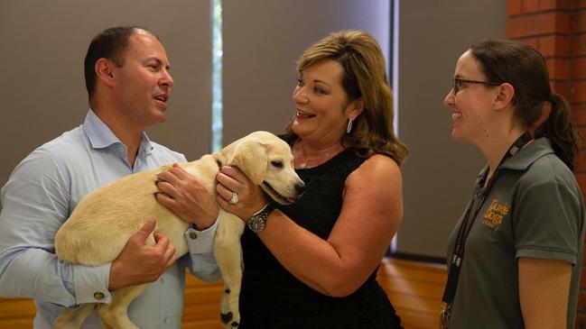 Federal Treasurer Josh Frydenberg with Guide Dogs Victoria chief executive Karen Hayes.