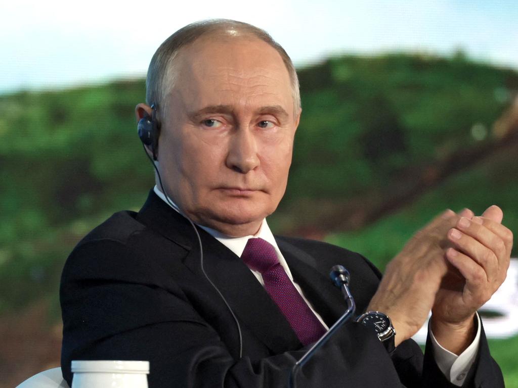 In this pool photograph distributed by the Russian state agency Sputnik, Russia's President Vladimir Putin attends a plenary session of the Eastern Economic Forum in Vladivostok on September 5, 2024. (Photo by Vyacheslav PROKOFYEV / POOL / AFP)