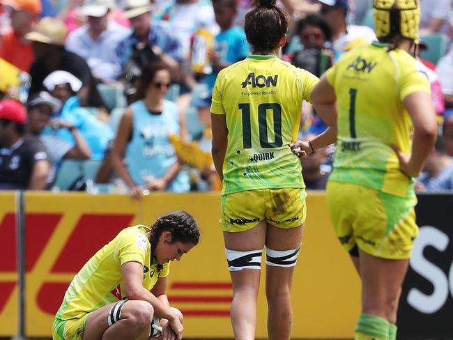 Australia's sevens stars Charlotte Caslick, Alicia Quirk and Shannon Parry after losing to Canada at the Sydney Sevens event.