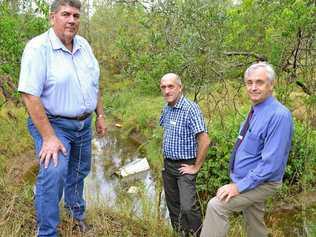 (From left) Somerset Regional Council Mayor Graeme Lehmann, natural resource manager Trevor Page and councillor Robin Caddy check out the state of waterways at Ferny Gully. . Picture: Contributed