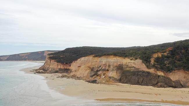 An area of cliff about 30m high and 60m wide has fallen onto the beach along a popular Surf Coast beach. Picture: Alan Barber