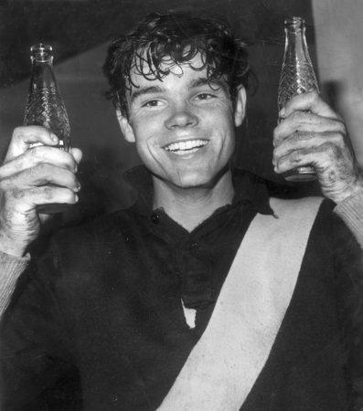 9: FRANCIS BOURKE. Bourke jokes with photographers in his first season with with Richmond in1967. Nicknamed 'St Francis', Bourke won five premierships, a place in the AFL Team of the Century, but never a Brownlow medal.