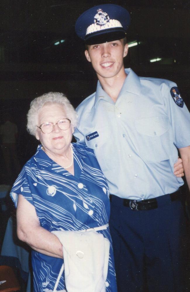 Peter Dutton in his police uniform with his grandmother. Picture: Supplied