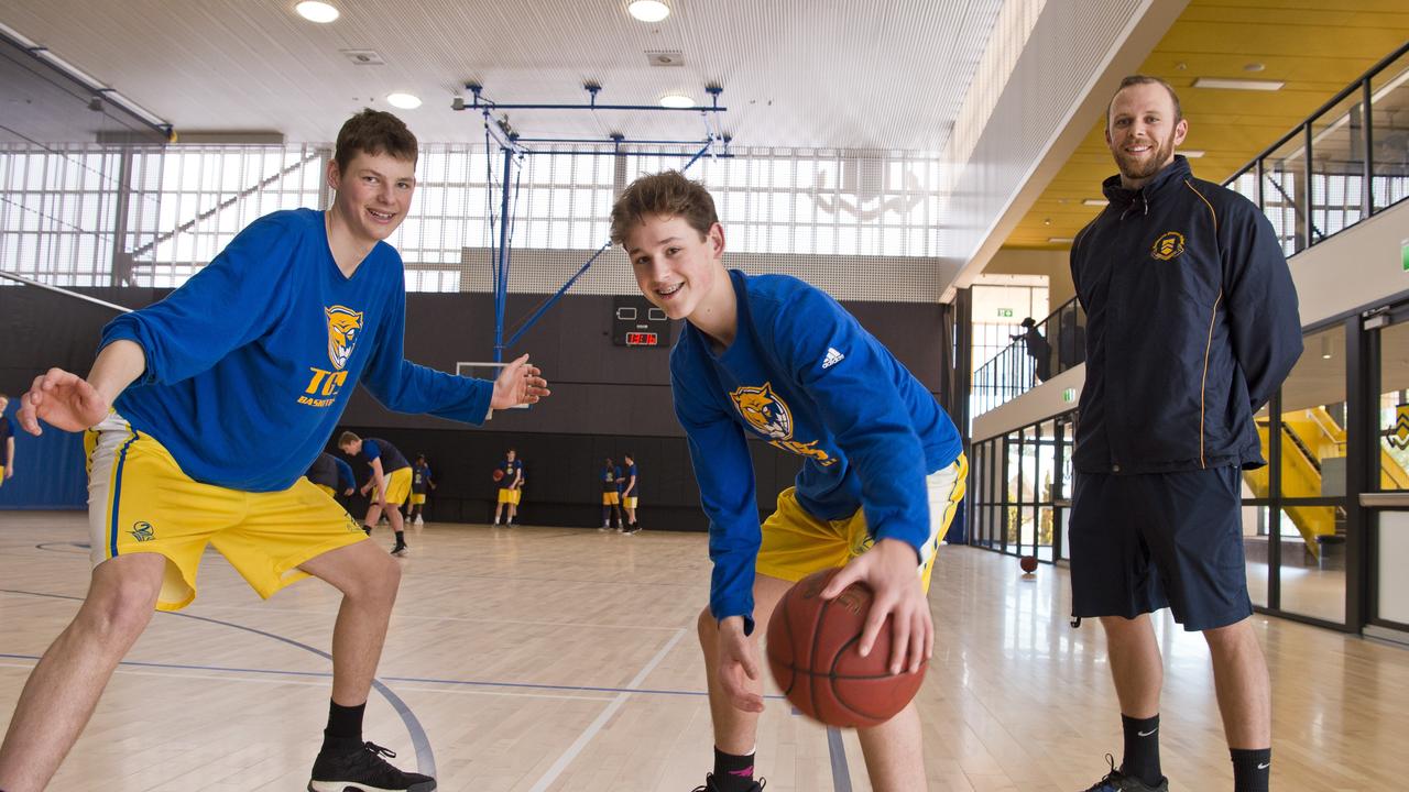 Toowoomba Grammar School basketball captain Jason Spurgin (left) and Samuel Harmsworth with Kabe Cicolini in 2018.