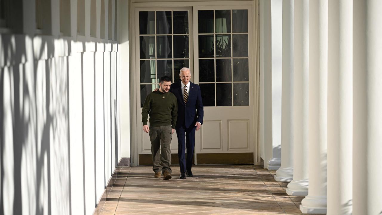 US President Joe Biden walks with Ukraine’s President Volodymyr Zelenskyy through the colonnade of the White House. Picture: AFP