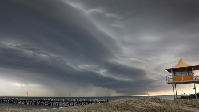 TO THIS: The clouds are building for more cold, wet weather. Picture: Dean Martin