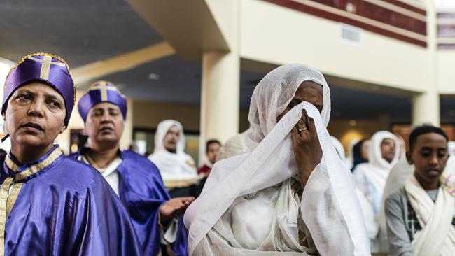 Members of the Ethiopian community take part in a special prayer for the victims. Picture: AP