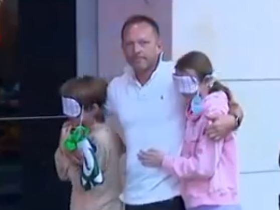 A father who masked the eyes of his kids in wake of Westfield Bondi Junction stabbing tragedy. Picture: 7NEWS