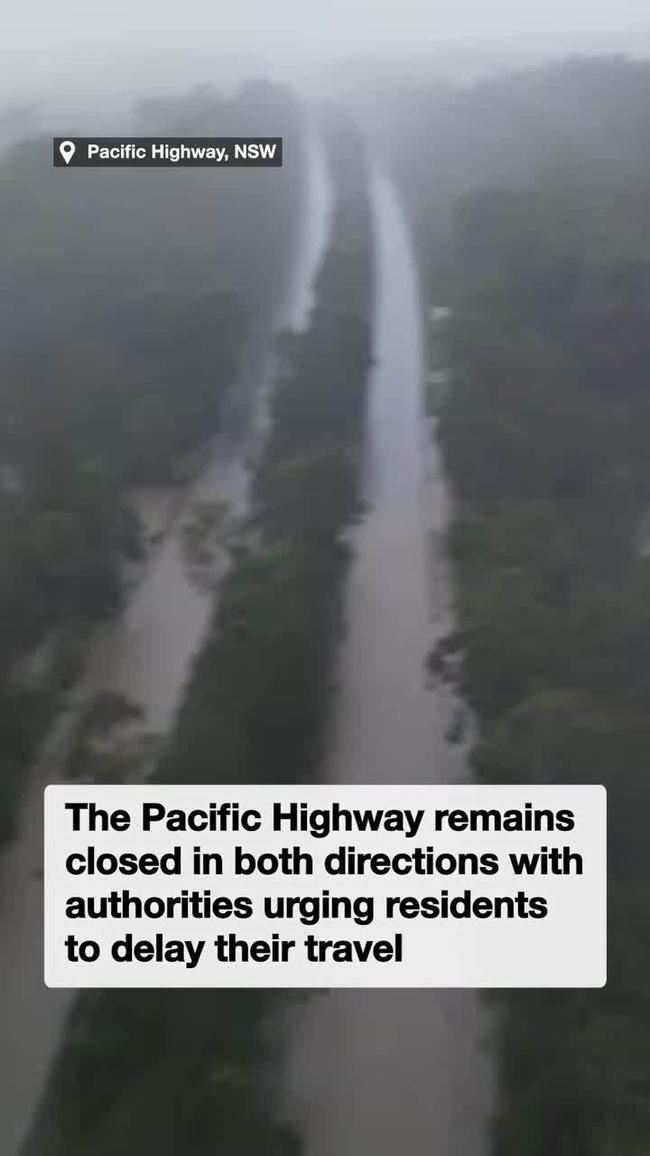 Pacific Highway turned into a river as flooding hits the Mid North Coast of NSW