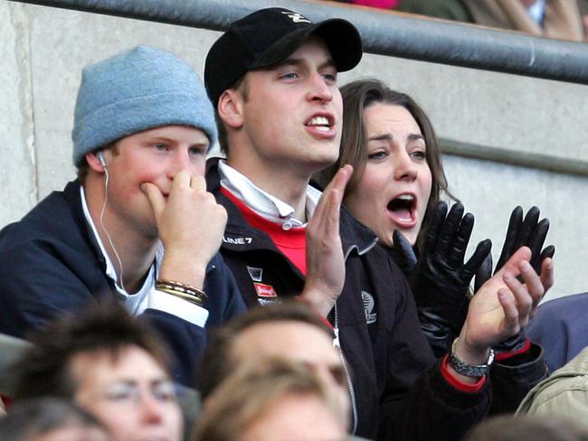 Prince William, centre, his then-girlfriend Kate Middleton and brother Prince Harry in 2007. Picture: AP Photo/Alastair Grant, File