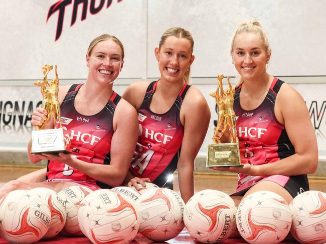 SPORT ADVNETBALL-Team Girls Cup T-Bird  playersHannah Petty, Tayla Williams & Lauren Frew with back to back trophiesImage/Russell Millard Photography