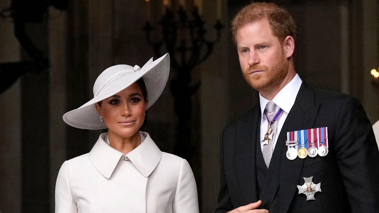 Prince Harry, Duke of Sussex, and Meghan, Duchess of Sussex, leave at the end of the National Service of Thanksgiving for The Queen's reign at Saint Paul's Cathedral in London (Photo by Matt Dunham / POOL / AFP)