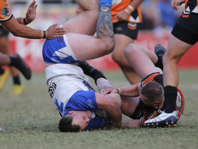 Tugun’s Jack Glossop in a contest for the ball. Photo: Regi Varghese