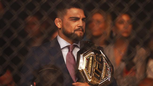 Kelvin Gastelum ringside in Melbourne with a fake UFC belt. Picture: AAP