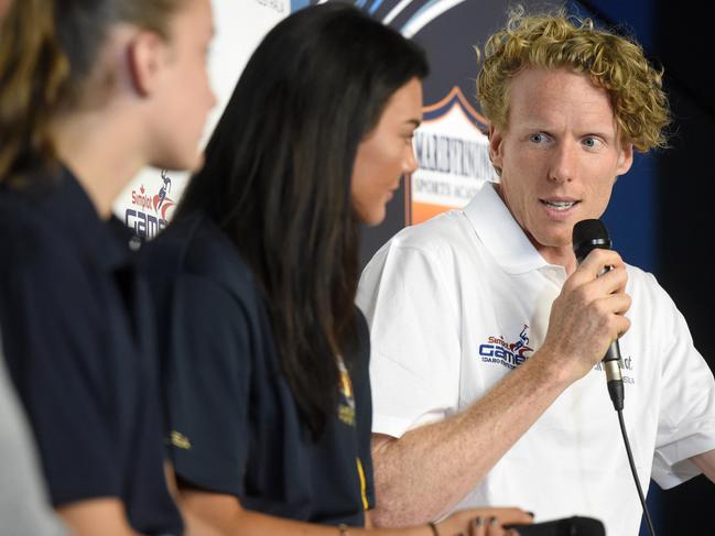 Simplot Ambassador and World and Olympic Champion STEVEN HOOKER will once again be leading the green-and-gold squad, and today had the honour of handing out the official team kit to some of our brightest emerging athletics stars. L-R Head of Sport at Maribyrnong Sports Academy, Jamieson Battistella, Celeste Mucci and Steve Hooker. Picture: Kylie Else