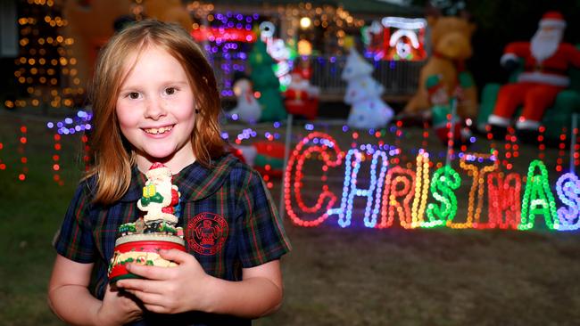 Samantha Phillip and her siblings love their mother’s Christmas display. Picture: Angelo Velardo