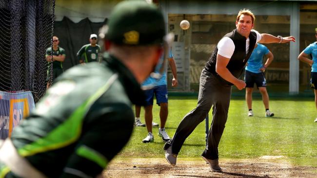 Shane Warne shares his knowledge with Australia batsmen.