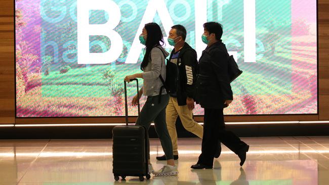 International arrivals at Sydney airport. The Morrison government wants to steadily increase permanent ­migration back to about 160,000 a year. Picture: Gaye Gerard