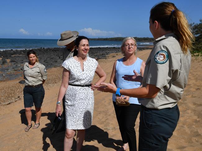 Premier Annastacia Palaszczuk (centre) on the beach at the Mon Repos Turtle Centre in Bundaberg with Member for Bundaberg Leanne Donaldson (second from right). Picture: Darren England/AAP