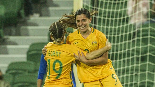 Alex Chidiac (right) of the Matildas celebrates a goal with teammate Katrina Gorry during the International friendly match between the Australian Matildas and Thailand at NIB Stadium in Perth, Monday, March 26, 2018. (AAP Image/Tony McDonough) NO ARCHIVING, EDITORIAL USE ONLY