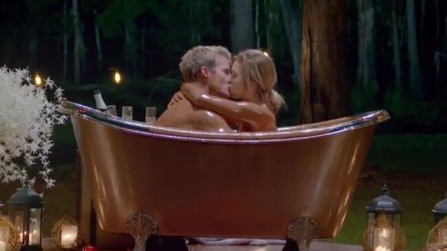 The Bachelor’s Alex Nation and Richie Strahan on their notorious ‘chocolate bath’ date. (Picture: Channel 10)<br/>