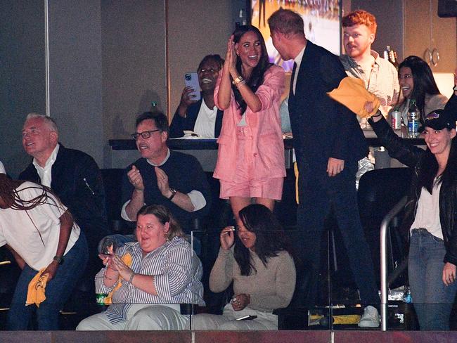 Meghan returns: Prince Harry and his wife made a public appearance recently at a basketball game in Los Angeles. Picture: Allen Berezovsky/Getty Images