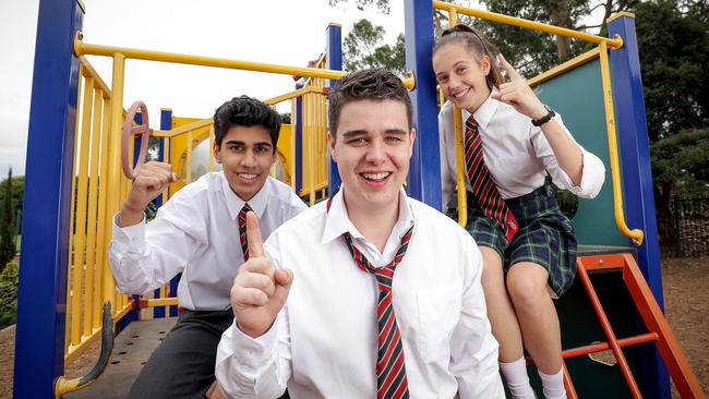 The Knox School students Bhavesh Kapadia, Mitchell Phelan and Victoria Caetano may have a cybercrime solution at their fingertips. Picture: Nicole Cleary