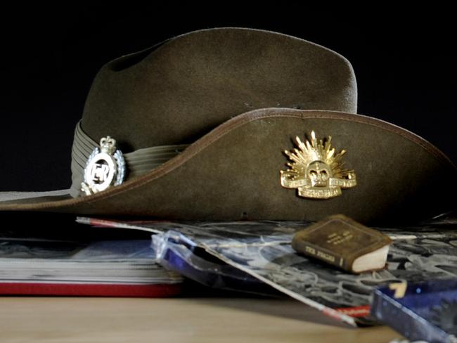 Brookland Village retirement home at Robertson are holding an Anzac exhibition on April 21. Brookland resident Lorna Rodgers with some of the memorabillia that will be on show. Photograph; Renae Droop