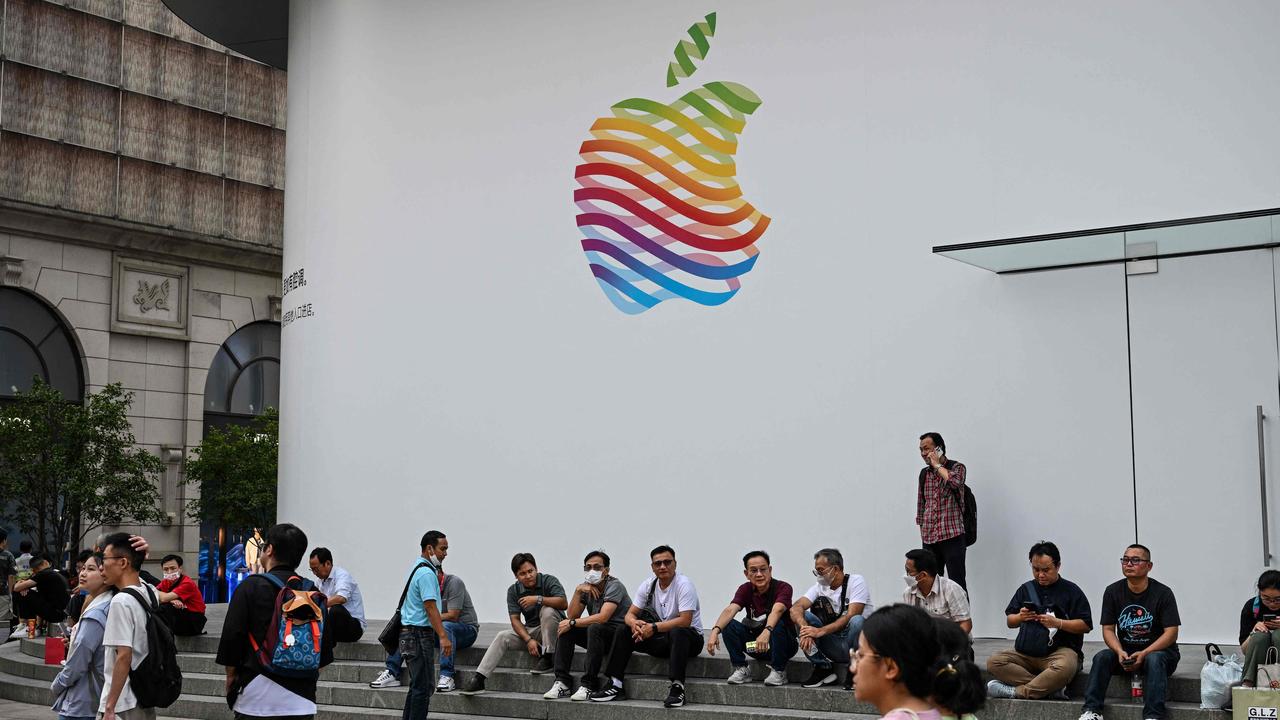 Apple’s stocks have taken a hit over the last two days after Beijing announced a ban on iPhones in government agencies and state enterprises. (Photo by Hector RETAMAL / AFP)