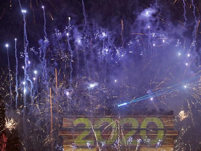 Fireworks set to mark the New Year explode over the Arc de Triomphe on the Champs Elysees, in Paris, France. Picture: AP