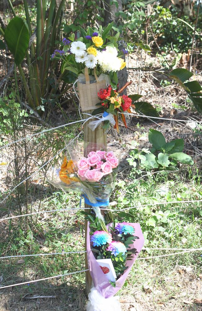 Floral tributes at the scene of the crash that killed a nine-year-old boy at Robina Town Centre Drive on Wednesday. 25 October 2024 Robina Picture by Richard Gosling