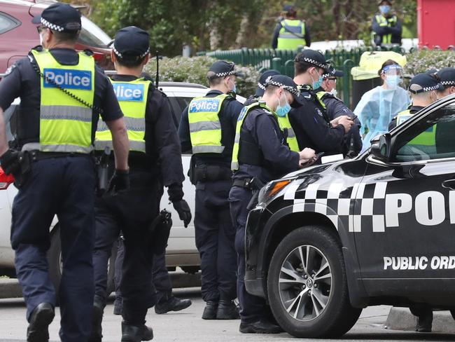 Hundreds of police were deployed to contain the residents. Picture: David Crosling