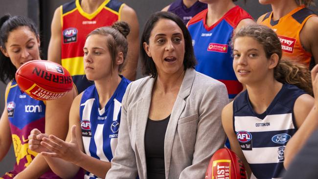 AFLW boss Nicole Livingstone with a group of AFLW players. Picture: AAP Image/Daniel Pockett.