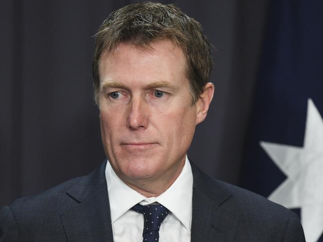 Australian Attorney-General Christian Porter speaks to the media during a press conference at Parliament House in Canberra, Wednesday, May 9, 2018. The Turnbull government is calling for the resignations of four MPs after the High Court disqualified Labor senator Katy Gallagher over her dual citizenship. Attorney-General Christian Porter says therefore it's time for Labor MPs Susan Lamb, Justine Keay and Josh Wilson, as well as independent Rebekha Sharkie to stand down, given their British ancestry. (AAP Image/Lukas Coch) NO ARCHIVING