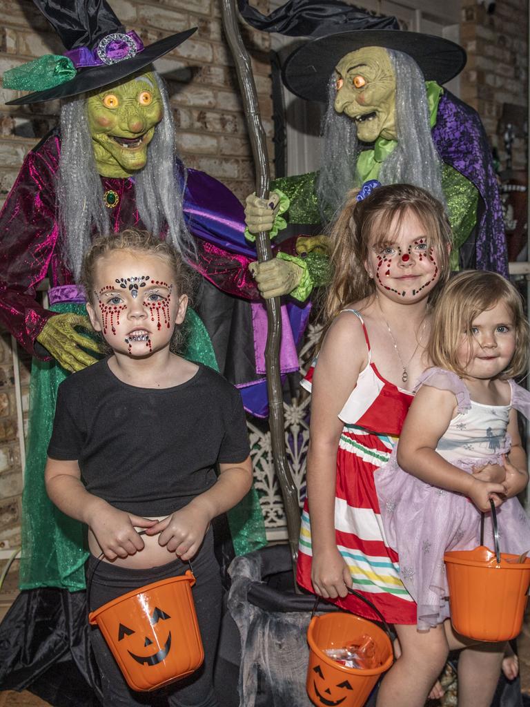 (from left) Chelsea, Hailey and Alyssa Stelling visit the Halloween display of Jo Philp. Monday, October 31, 2022. Picture: Nev Madsen.