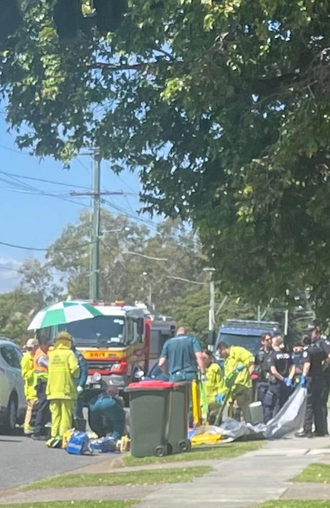 Rescuers at the scene of the alleged hit run at Wynnum West. Picture: Supplied