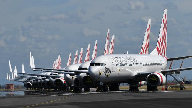 Grounded Virgin Australia aircraft at Brisbane Airport. Picture: AAP