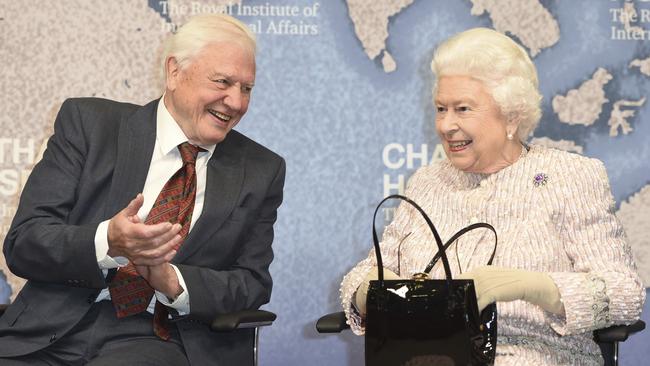 The Queen with David Attenborough at the Chatham House Prize for 2019 in London on Thursday. Picture: AP